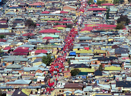 From Alexandra Slums to Sandton Fashionable Neighborhood, Johannesburg, August 31, 2002.